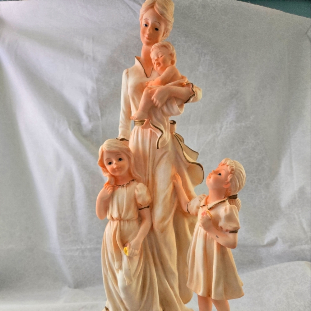 Elegant Family Figurine in Cream and Gold